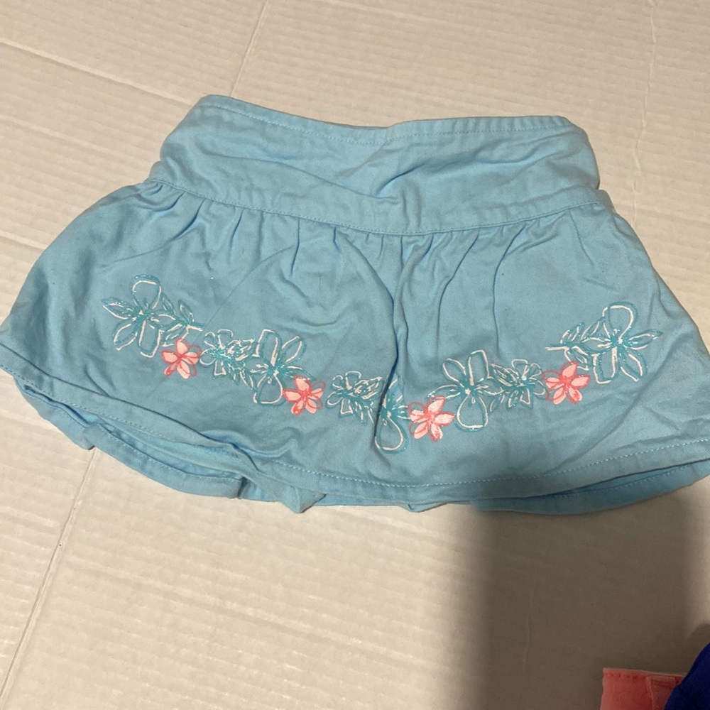 Disney blue skirt with pink flower detail size 4t